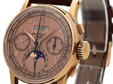 patek philippe 1518 in pink gold and steel|Patek Philippe 1518 in gold.